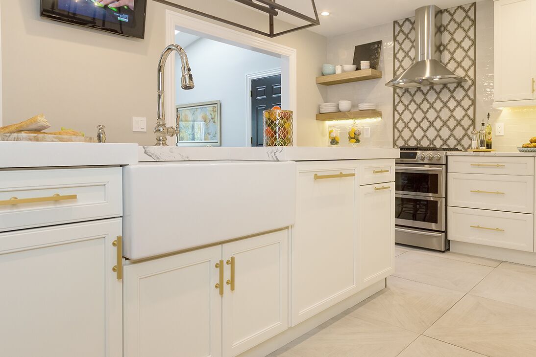 large-sink-white-cabinets-gold-hardware-merrick-ny