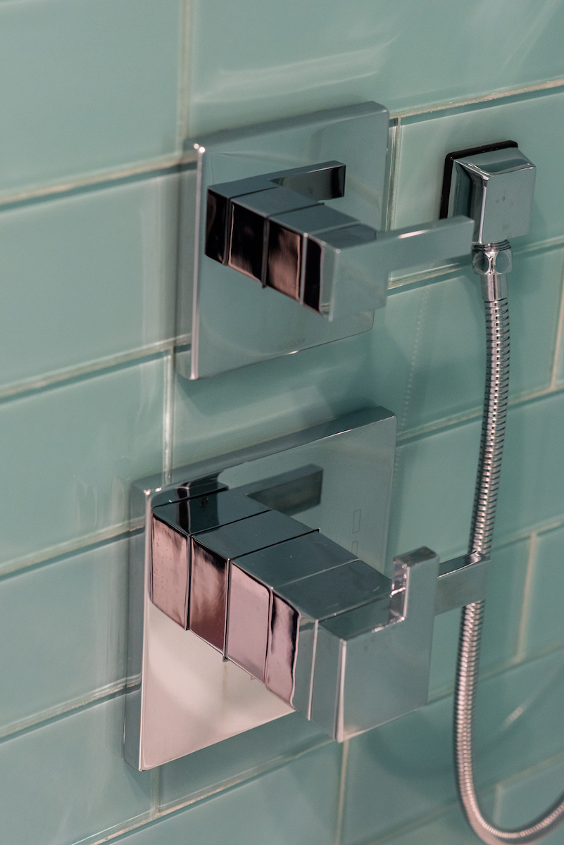 shower-stainless-steel-fixtures-teal-tile