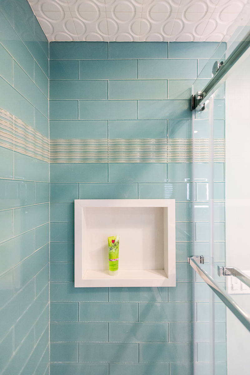 teal-blue-tile-shower-built-in-shelf
