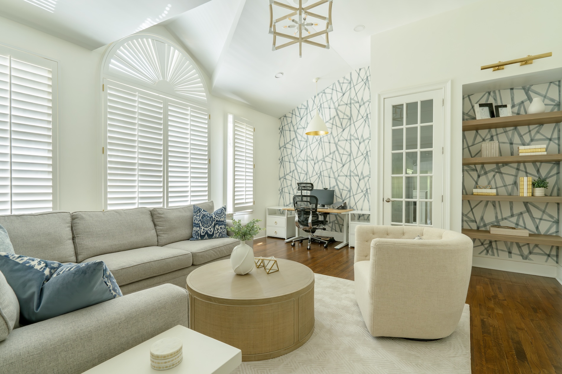 Living Room And Home Office Design With Accent Wallpaper